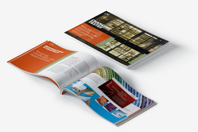 A printed eBook titled Changing Tastes: Branding and Marketing in the Food Processing Industry, displayed with an open spread featuring marketing strategy insights. The pages highlight turning challenges into opportunities and showcase branding materials for food processing companies.
